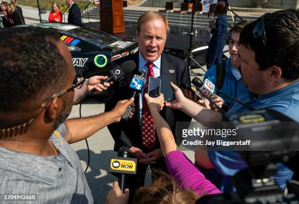 Rusty Wallace, NASCAR Hall of Famer talks with media after a NASCAR press conference at the Iowa State Capitol on October 3, 2023 in Des Moines,...