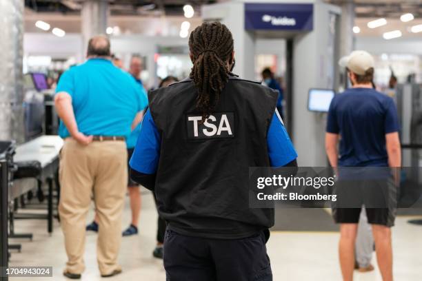 Transportation Security Administration officer at Hartsfield-Jackson Atlanta International Airport in Atlanta, Georgia, US, on Monday, Oct. 2, 2023....