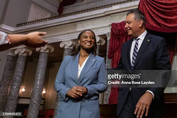 Sen. Laphonza Butler speaks with Sen. Alex Padilla in the Old Senate Chamber following her ceremonial swearing-in at the U.S. Capitol in Washington...