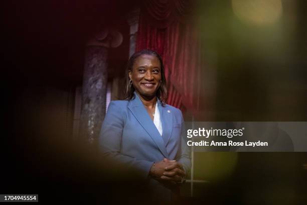 Senator-Delegate Laphonza Butler smiles as she waits for Vice President Kamala Harris to arrive at the Old Senate Chamber for her swearing-in at the...
