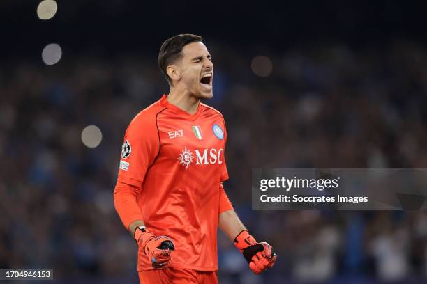 Alex Meret of SSC Napoli celebrates 2-2 during the UEFA Champions League match between Napoli v Real Madrid at the Stadio Diego Armando Maradona on...