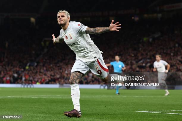 Galatasaray's Argentine forward Mauro Icardi celebrates scoring the team's third goal during the UEFA Champions league group A football match between...