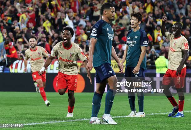 Lens' French forward Elye Wahi celebrates after scoring a goal his team's second goal during the UEFA Champions League Group B first leg football...