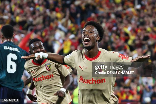 Lens' French forward Elye Wahi celebrates after scoring a goal his team's second goal during the UEFA Champions League Group B first leg football...