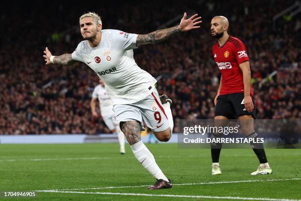 Galatasaray's Argentine forward Mauro Icardi celebrates scoring the team's third goal during the UEFA Champions league group A football match between...