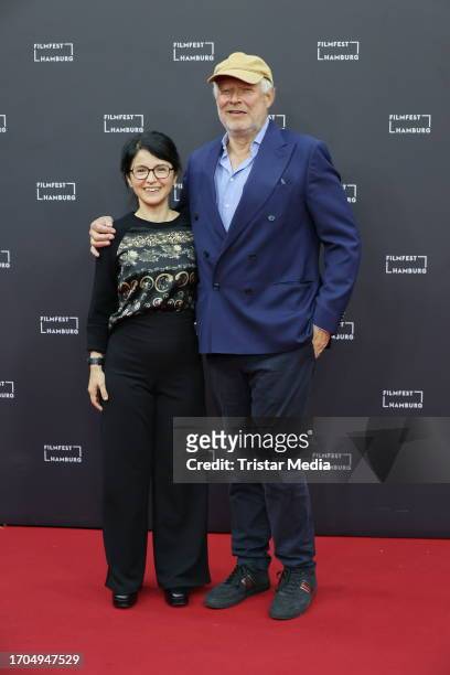 Ayse Polat and Axel Milberg attend the "Tatort Borowski und das unschuldige Kind von Wacken" premiere during the Hamburg film festival at Cinemaxx on...