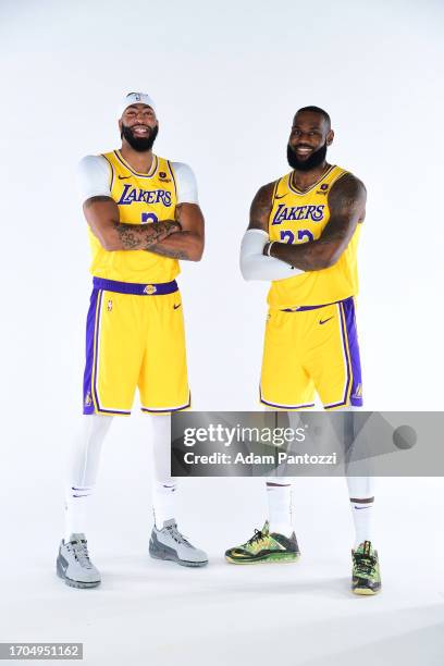 Anthony Davis and LeBron James of the Los Angeles Lakers pose for a portrait during 2023-24 NBA Media day at UCLA Health Training Center on October...