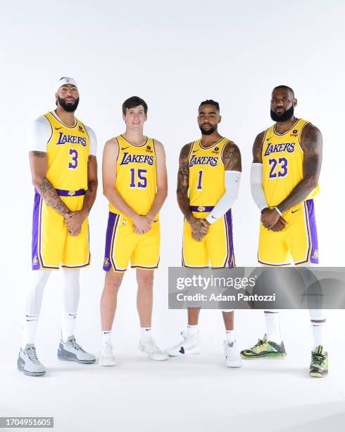 Anthony Davis, Austin Reaves, D'Angelo Russell and LeBron James of the Los Angeles Lakers pose for a portrait during 2023-24 NBA Media day at UCLA...