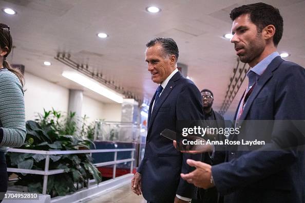 Senate Basement Senator Mitt Romney walks through the Senate basement to vote on ...