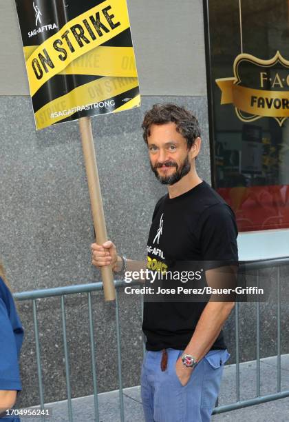 Hugh Dancy is seen on the SAG-AFTRA picket line on October 03, 2023 in New York City.