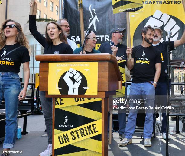 Margarita Levieva , Megan Boone and Hugh Dancy is seen on the SAG-AFTRA picket line on October 03, 2023 in New York City.