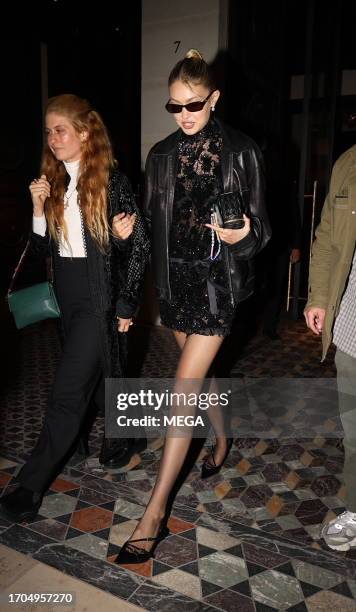 Gigi Hadid seen together at Costes restaurant on October 3, 2023 in Paris, France.