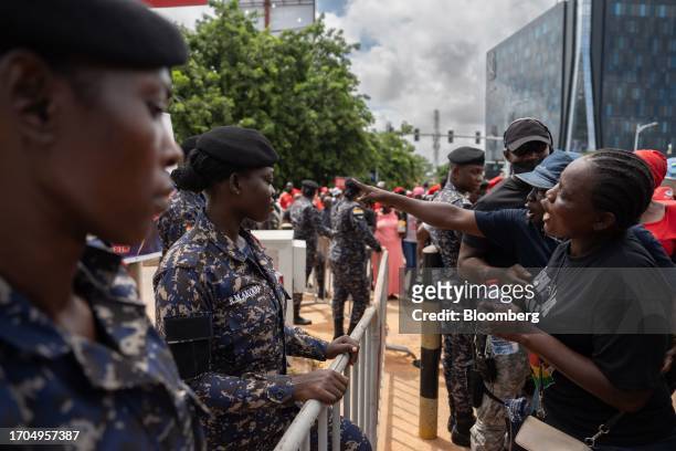 Police officers stand guard during the the 'Occupy Bank of Ghana' protest in Accra, Ghana, on Tuesday, Oct. 3, 2023. The demonstration is the latest...