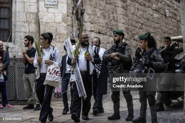 Israeli police take security measures as Activist Jewish settlers, who are under the protection of Israeli police, storm Al-Aqsa Mosque on 5th day of...