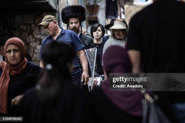 Activist Jewish settlers, who are under the protection of Israeli police, storm Al-Aqsa Mosque on 5th day of Sukkot holiday through Bab al-Qattanin ,...