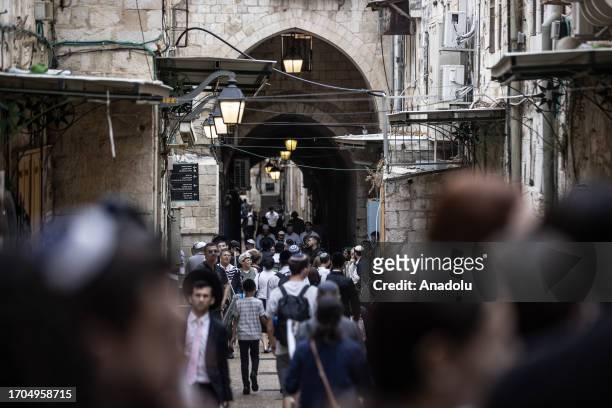 Activist Jewish settlers, who are under the protection of Israeli police, storm Al-Aqsa Mosque on 5th day of Sukkot holiday through Bab al-Qattanin ,...