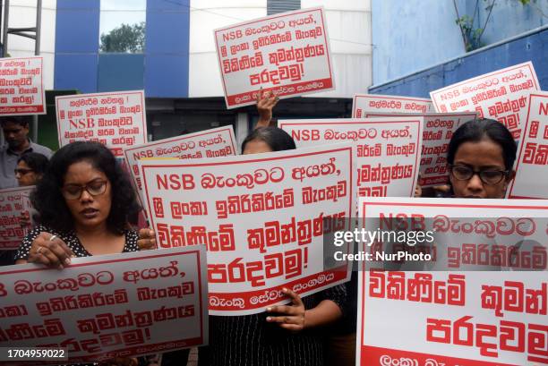 Members of Ceylon Bank Employees Union protest in front of Sri Lanka Savings Bank, They demand don't merge National Savings Bank and Sri Lanka...