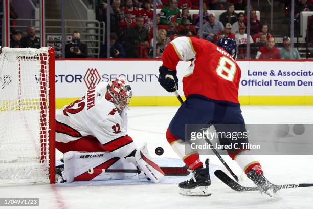 Gerry Mayhew of the Florida Panthers scores a goal against Antti Raanta of the Carolina Hurricanes during the first period of their game at PNC Arena...