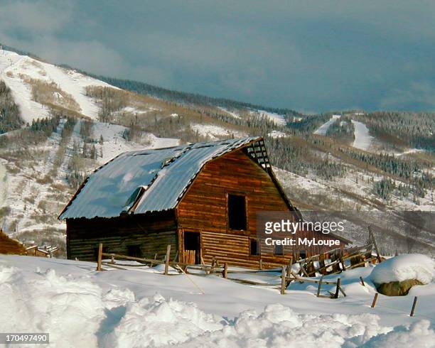 Frontier Cabin In Steamboat Springs, Colorado, With The Ski Area In The Background.