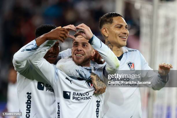 Ezequiel Piovi of Liga de Quito celebrates with teammates after scoring the team's third goal during a Copa CONMEBOL Sudamericana 2023 match between...