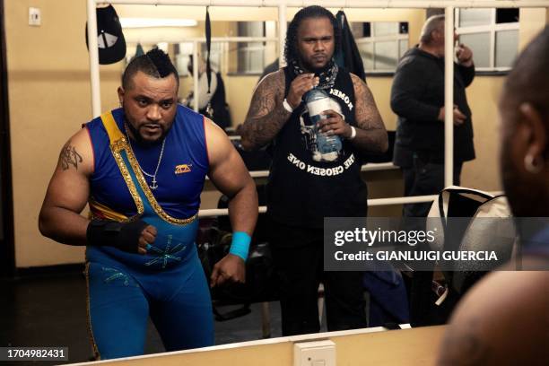 Wrestler Zephy from Democratic Republic of Congo gets ready ahead of the Four Men Tag Match against Freak Show and Mr. Money during the Africa...