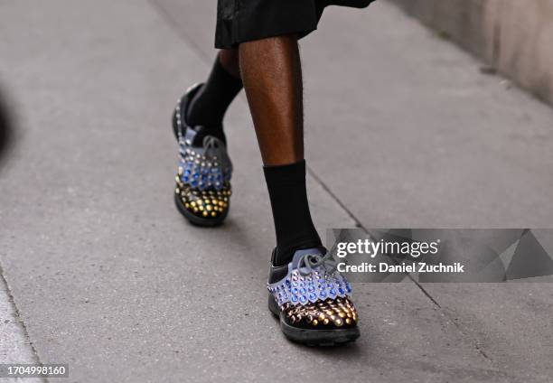 Guest, shoes detail, is seen wearing studded shoes outside the Marni show during the Womenswear Spring/Summer 2024 as part of Paris Fashion Week on...