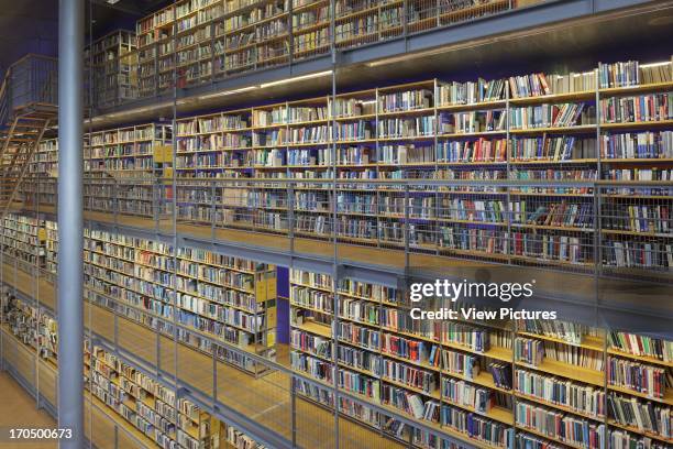 Detail of suspended bookcase with column, TU Delft Library, Delft, Netherlands, Architect: Mecanoo Architecten, 1997.