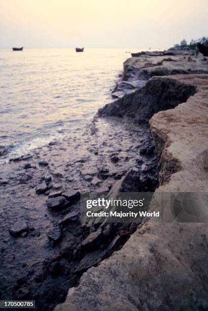 Landscape of the eroding shoreline of the Bay of Bengal, after the 1991 cyclone. The 1991 cyclone was one of the deadliest tropical cyclones on...