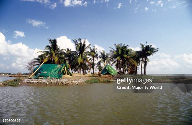 Temporary shelters for the cyclone affected people, on the bank of Sangu river, in Banshkhali upazila of Chittagong district, in Bangladesh. 1991....