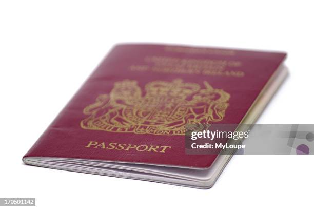 Worn Out British Eu Passport On White Background.