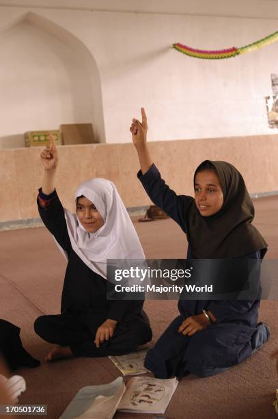 Literacy Movement Class for Afghan girls in Ghaleh neighbourhood of Menab city in Hormogan Province. Iran. January 26, 2004. .