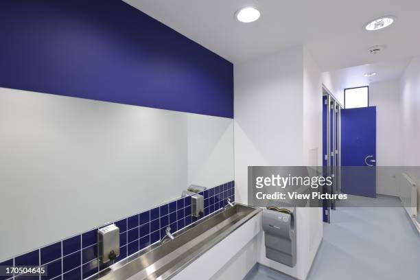 Interior of boys' toilet showing washbasins and hand dryer, Strood Academy, Academy School, Europe, United Kingdom, Kent Nicholas Hare Architects LLP.