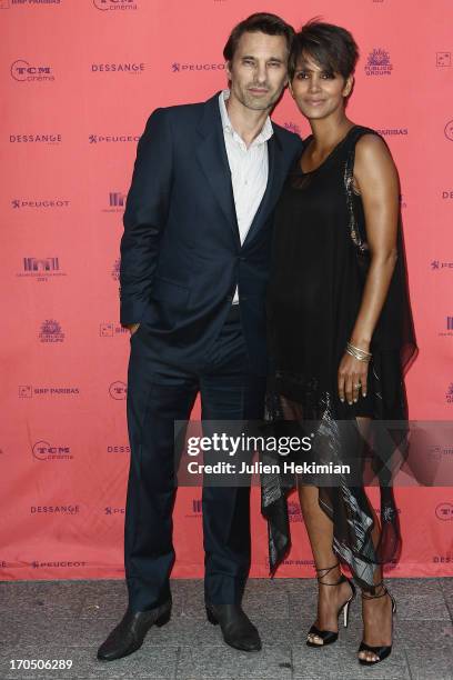 Olivier Martinez and Halle Berry attend the 'Toiles Enchantees' Red Carpet As Part of The Champs Elysees Film Festival 2013 at Publicis Champs...