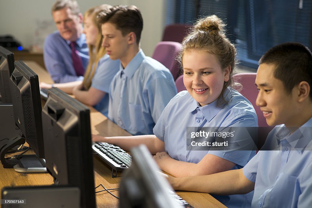 Happy students in computer class