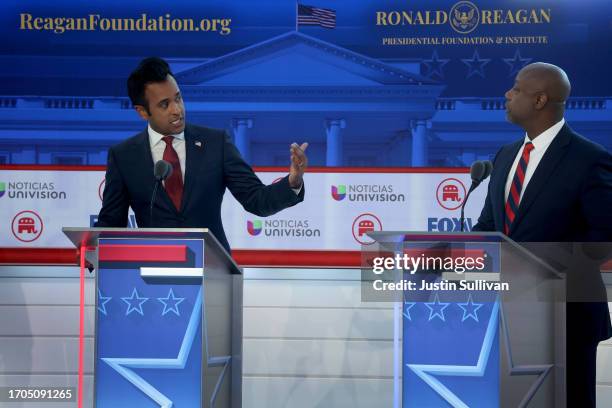 Republican presidential candidate Vivek Ramaswamy and U.S. Sen. Tim Scott participate in the FOX Business Republican Primary Debate at the Ronald...