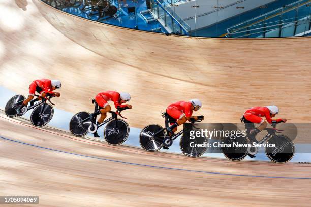 Players of Team Chinese Hong Kong compete in the Cycling Track - Women's Team Pursuit Final Bronze medal match on day four of the 19th Asian Games at...
