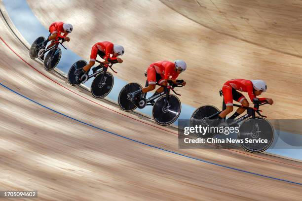 Players of Team Chinese Hong Kong compete in the Cycling Track - Women's Team Pursuit Final Bronze medal match on day four of the 19th Asian Games at...