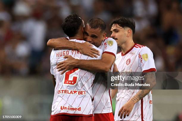 Hugo Mallo of Internacional celebrates with teammates after scoring the team's first goal during a Copa CONMEBOL Libertadores 2023 match between...