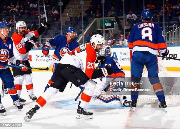 Ryan Poehling of Philadelphia Flyers scores a third period goal against the New York Islanders during a preseason game at UBS Arena on September 27,...