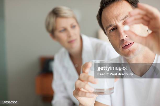 Getting Out Tablet 458 Man Holding Out Tablet Stock Photos, High-Res Pictures, and Images ...