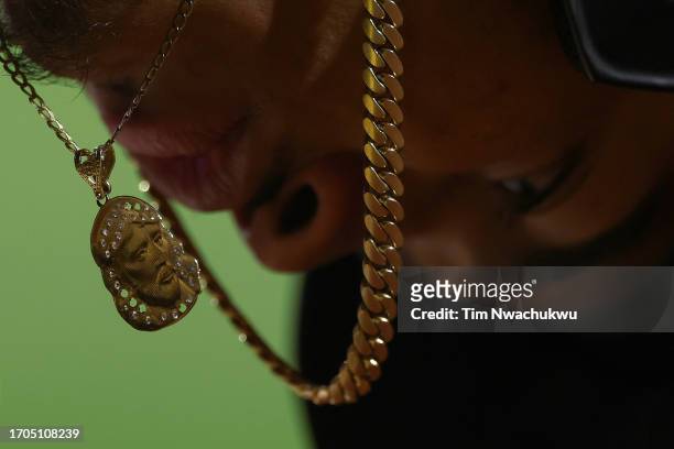 The necklace of Liover Peguero of the Pittsburgh Pirates is seen during the fifth inning against the Philadelphia Phillies at Citizens Bank Park on...