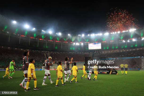 Players of Fluminense and Internacional enter the pitch prior to a Copa CONMEBOL Libertadores 2023 match between Fluminense and Internacional at...