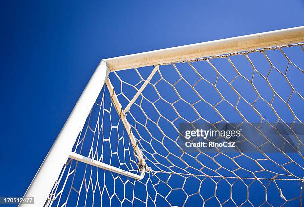 soccer goal net against blue sky - football net stock pictures, royalty-free photos & images