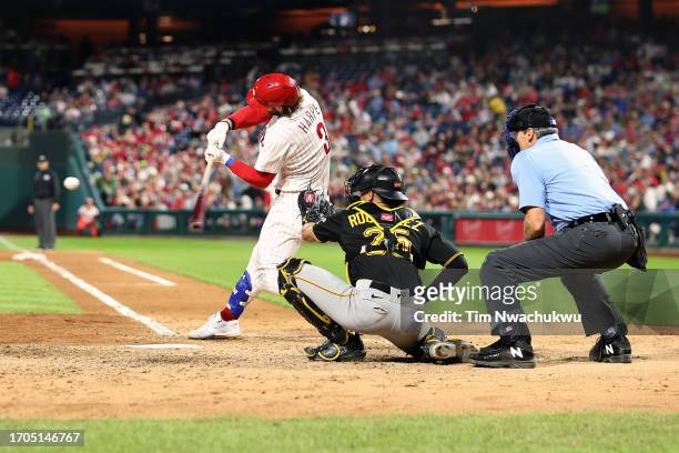 Bryce Harper of the Philadelphia Phillies hits a solo home run during the seventh inning against the Pittsburgh Pirates at Citizens Bank Park on...