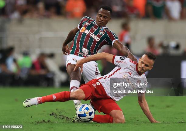 John Arias of Fluminense and René of Internacional compete for the ball during a Copa CONMEBOL Libertadores 2023 match between Fluminense and...