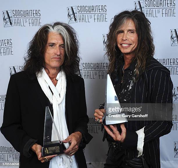 Joe Perry and Steven Tyler of Aerosmith attend the Songwriters Hall of Fame 44th Annual Induction and Awards Dinner at the New York Marriott Marquis...