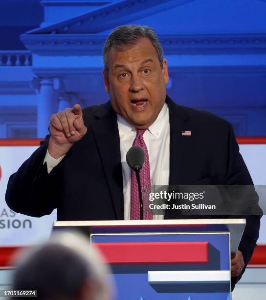 Republican presidential candidate former New Jersey Gov. Chris Christie delivers remarks during the FOX Business Republican Primary Debate at the...