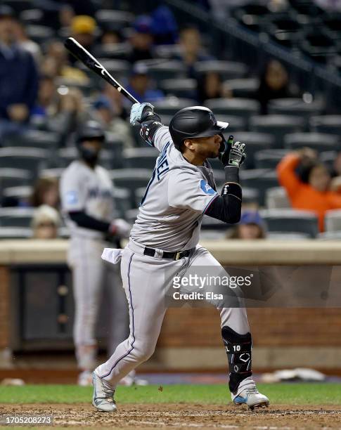 Yuli Gurriel of the Miami Marlins drives in the game winning run in the ninth inning against the New York Mets during game two of a double header at...