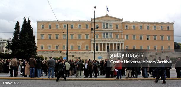 Protesters march in Syntagma square against austerity cuts to budgets by the out going Greek Government, during the financial crisis, Athens 2012.