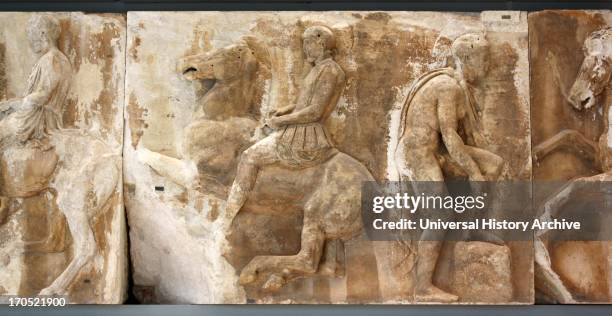 Horseman gallops towards the right. He is dressed as an hoplite with an anatomical cuirass with flaps made of leather, lion-shaped shoulder-straps...